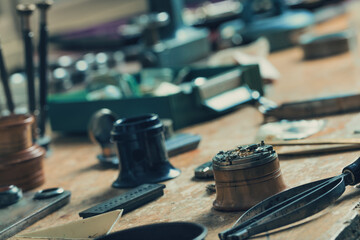 Tilted view of a watchmakers workshop and workbench