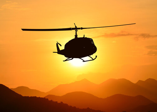 American utility military helicopter in the flight