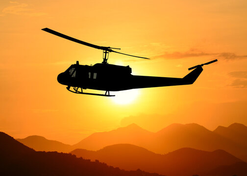 American utility military helicopter in the flight