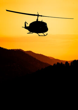 American utility military helicopter in the flight