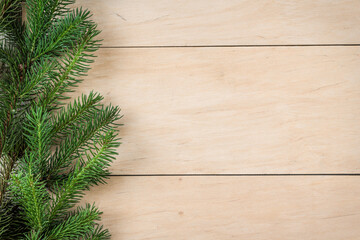 Christmas fir tree on a wooden board. Copy space