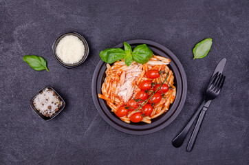 Pasta with tomatoes, red sauce and cheese