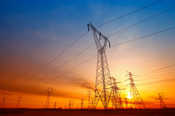 Fototapeta premium Wire electrical energy at sunset