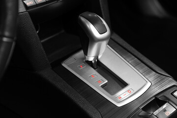 Close-up view of the automatic gearbox lever. Interior car,  automatic transmission gearshift stick