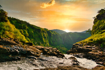 Beautiful waterfall with dramatic sky, somewhere in the Sahyadri ranges of western ghats of...