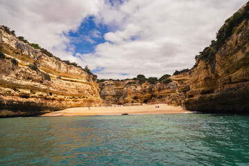 Obraz premium beach among the rocks in the sea
