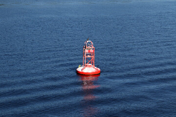 Red maritime navigation buoy