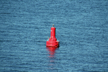 Red maritime navigation buoy