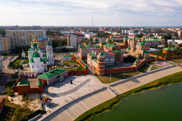 Aerial view of Yoshkar-Ola Kremlin, Trinity Church and Resurrection Cathedral on Kokshaga river embankment, Mari El, Russia