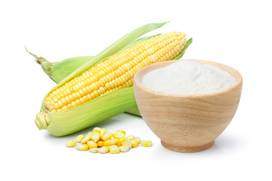 Corn starch in wooden bowl and fresh sweet corn isolated on white background. 