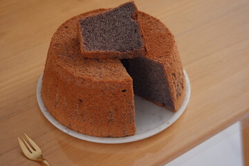 black glutinous chiffon cake on a plate 