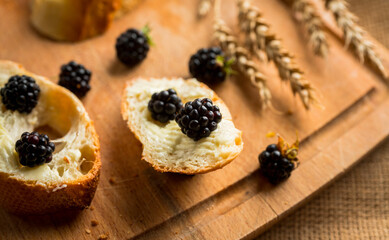 Snack with fresh blackberries. Selective focus.