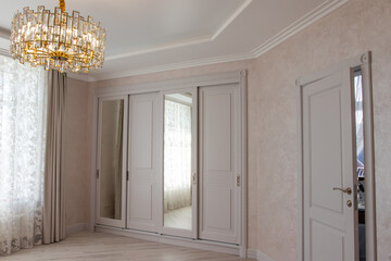 modern lamps in a large house. Chandeliers of an interesting configuration with bends and contours