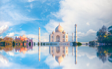 Panoramic view of Taj Mahal during bright blue sky reflected in water - Agra , Uttar Pradesh, India