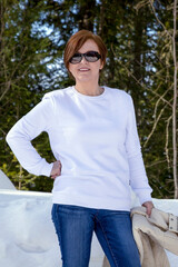 White sweatshirt mockup of a woman in the winter forest, model mockup, model mockup