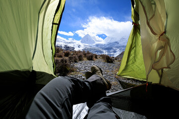 Fototapeta premium Hiker enjoy the beautiful landscape in tent