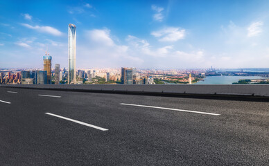 Empty asphalt road and city skyline and building landscape, China.