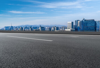 Empty asphalt road and city skyline and building landscape, China.