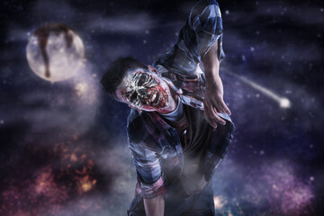 Scary zombie man walking at Halloween night