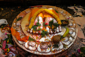Kathmandu, Nepal - October 2021: Reclining statue of Vishnu as Narayan, the creator of all life in...