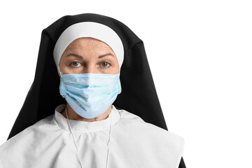 Mature nun in medical mask on white background