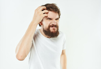 Fototapeta premium Man in a white t-shirt expressive look discontent Lifestyle