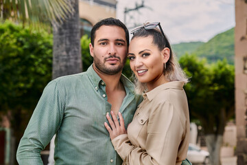 Young Latino male and female couple in love between 25 and 35 years of age