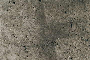 Close-up of the old concrete pavement. Dirty concrete floor. The texture of old concrete.