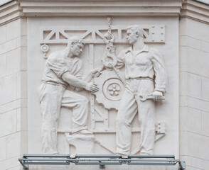 Obraz premium Themed sculptural murals decorating the walls of buildings. Bas-relief on the wall.