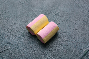 Sweet pastille marshmallows on dark background