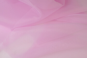 ピンクの布のウェーブ　ブルーの背景
