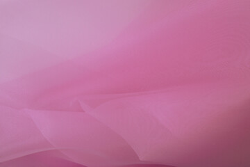 ピンクの布のウェーブ　ブルーの背景
