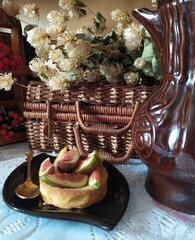 still life with papaya cake nier the basket and white flowers