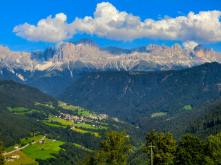 Fototapeta premium Panoramic landscape of Val d Ega, Eggen valley, summer 2021, South Tyrol, Italy, Europe