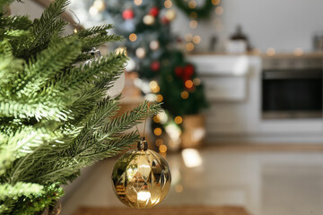 Beautiful Christmas tree in kitchen, closeup