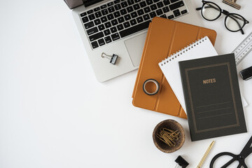 Aesthetic minimalist home office desk workspace on white background. Notebook, laptop computer,...