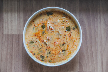 Spicy sprawn soup is called tom yum kung which famous thai style street food.