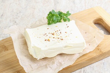 Greek Feta cheese over board