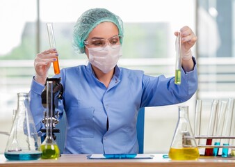 Woman chemist working in the lab