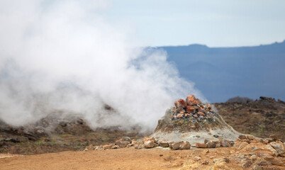 Steaming fumarole in geothermal area of Hverir, Iceland