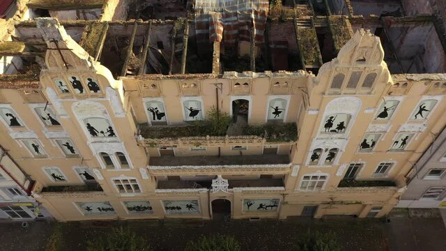 The old damaged Theater of Queen Louise in Sovetsk, Russia, view from a drone