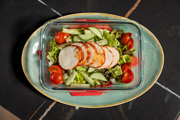 Roasted turkey medallions served with mixed green salad