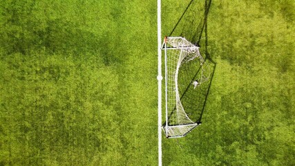 Aerial view of an empty soccer field. Overhead downward 4K footage © jovannig