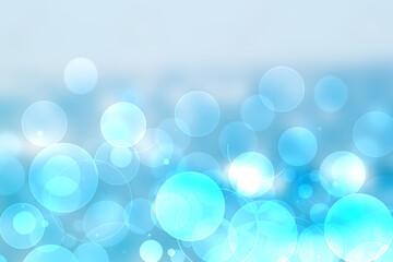 Abstract ocean background. Abstract bright light blue turquoise tropical ocean with sparkling waves and light blue sky and sun rays. Beautiful backdrop for summer holidays and travel advertising.