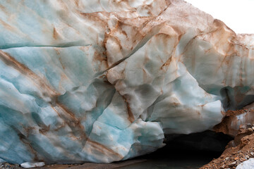 the texture of the blue ice of a mountain glacier