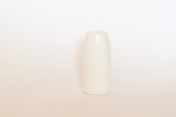 a white empty tube. Deodorant-antiperspirant for the body, an open and closed empty bottle with a lid. antiperspirant on a white background. space for text. the concept of beauty and body