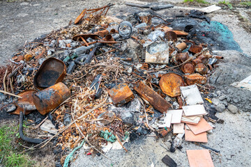 Waste dumping at the ruins of Lenan Head fort at the north coast of County Donegal, Ireland.