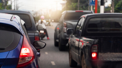 Transportation of blue car on the road. Open light break waiting to release traffic signals. On the asphalt road. Many cars prepare to travel or business time. Environment in the main city. 