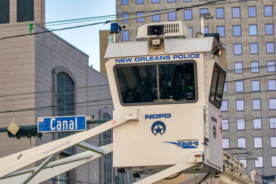 NEW ORLEANS, LA - FEBRUARY 9TH, 2016: New Orleans Police Cabinet above the crowd for Mardi Gras Carnival Parade.