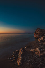 rocky coast of the mediterranean sea at dawn